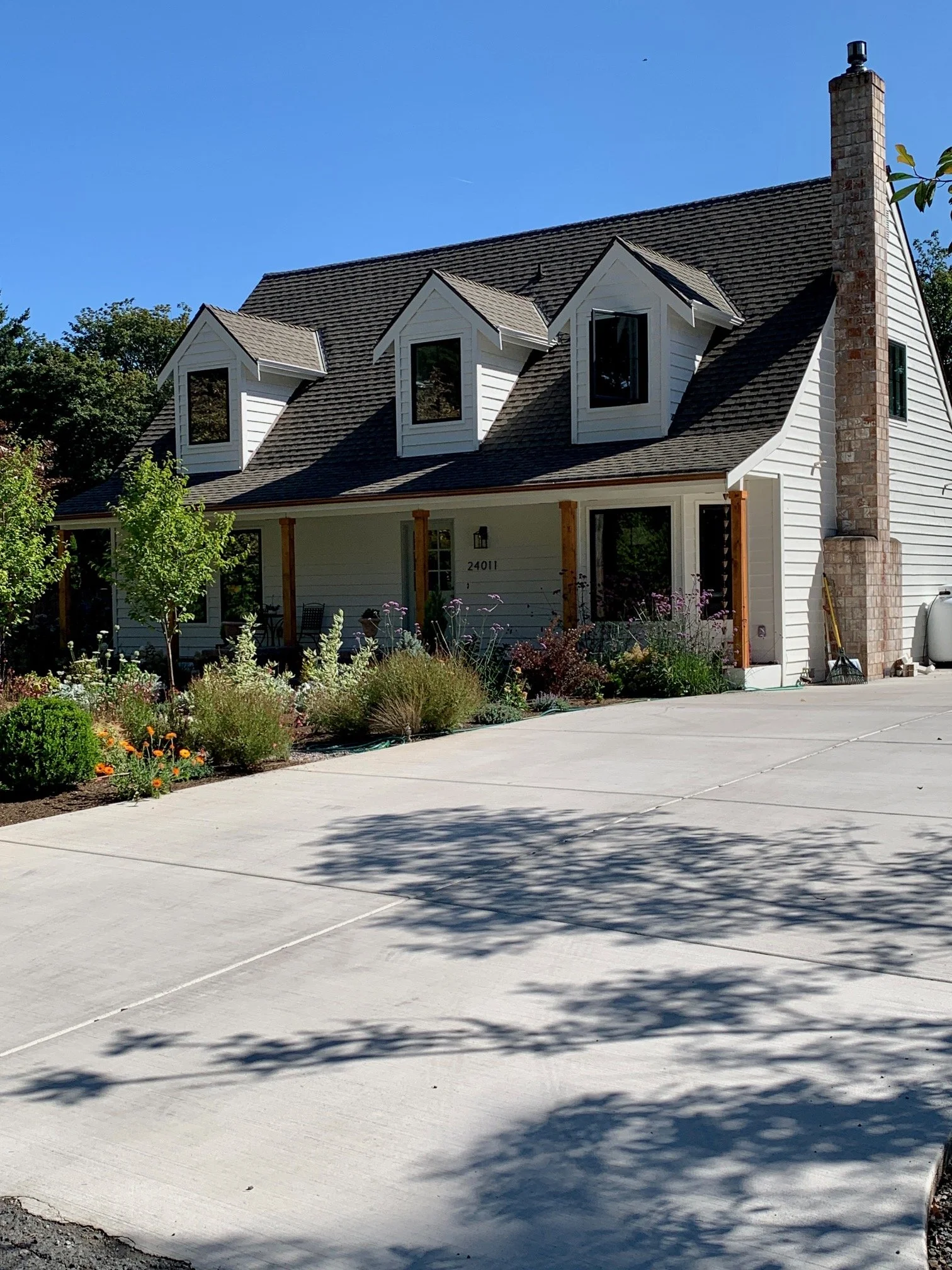Exterior painted in Sherwin Williams Greek Villa white